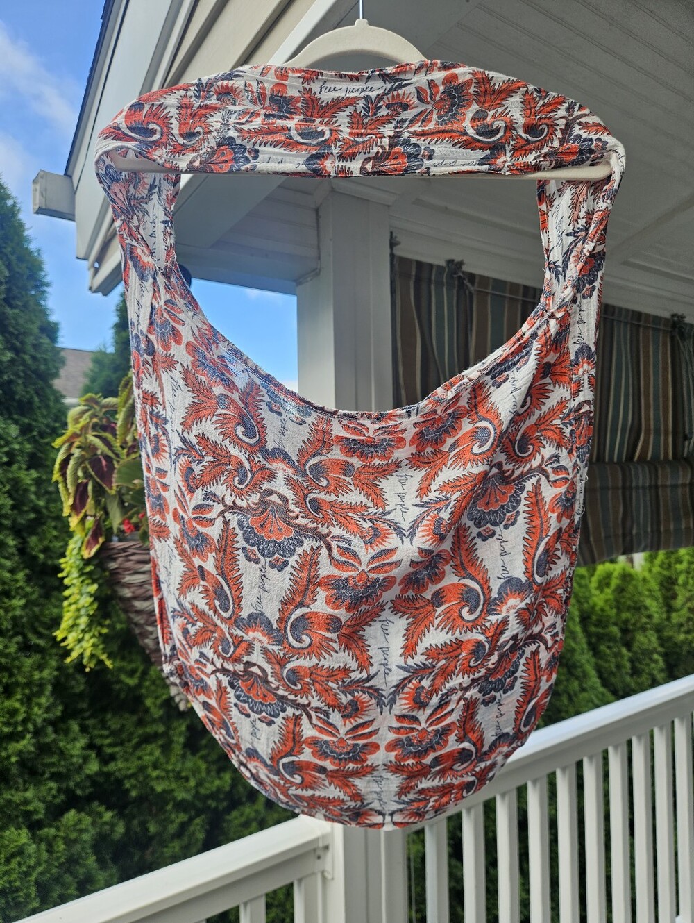 Free People Boho Printed Shoulder Hobo Bag in Orange and Navy. Logo On Bag.